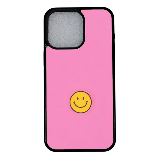 iPhone 12 suojakuori pinkillä taustalla ja keltaisella smiley‑emojilla – etunäkymä